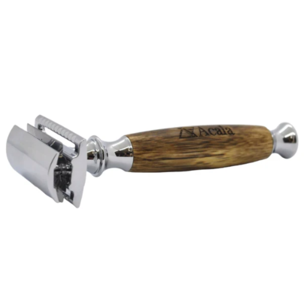 traditional style razor with chrome razor holder and chunky wooden handle embossed with acala's brand name.