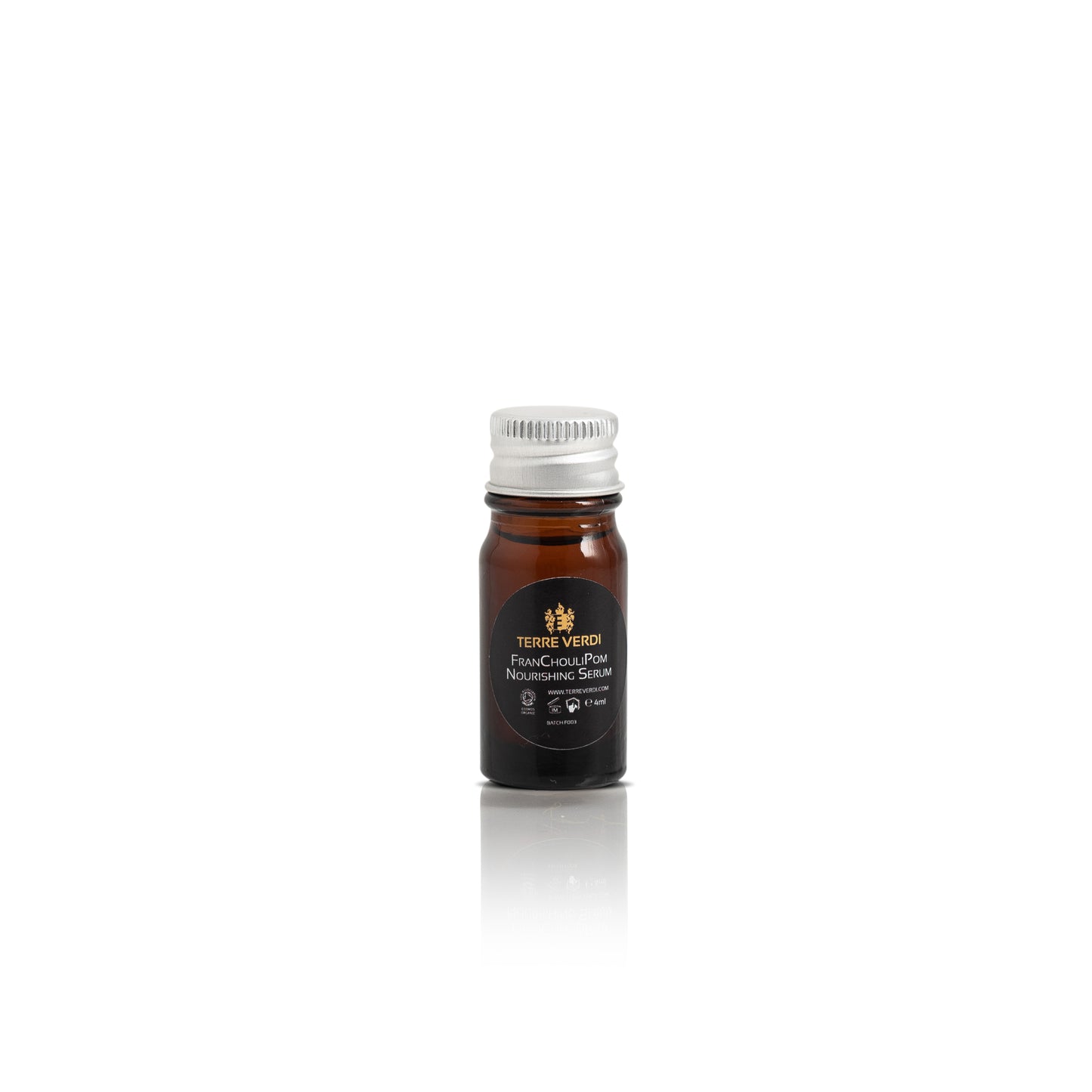 small amber glass bottle with a silver aluminium lid with a frankincense patchouli and pomegranate organic oil serum inside
