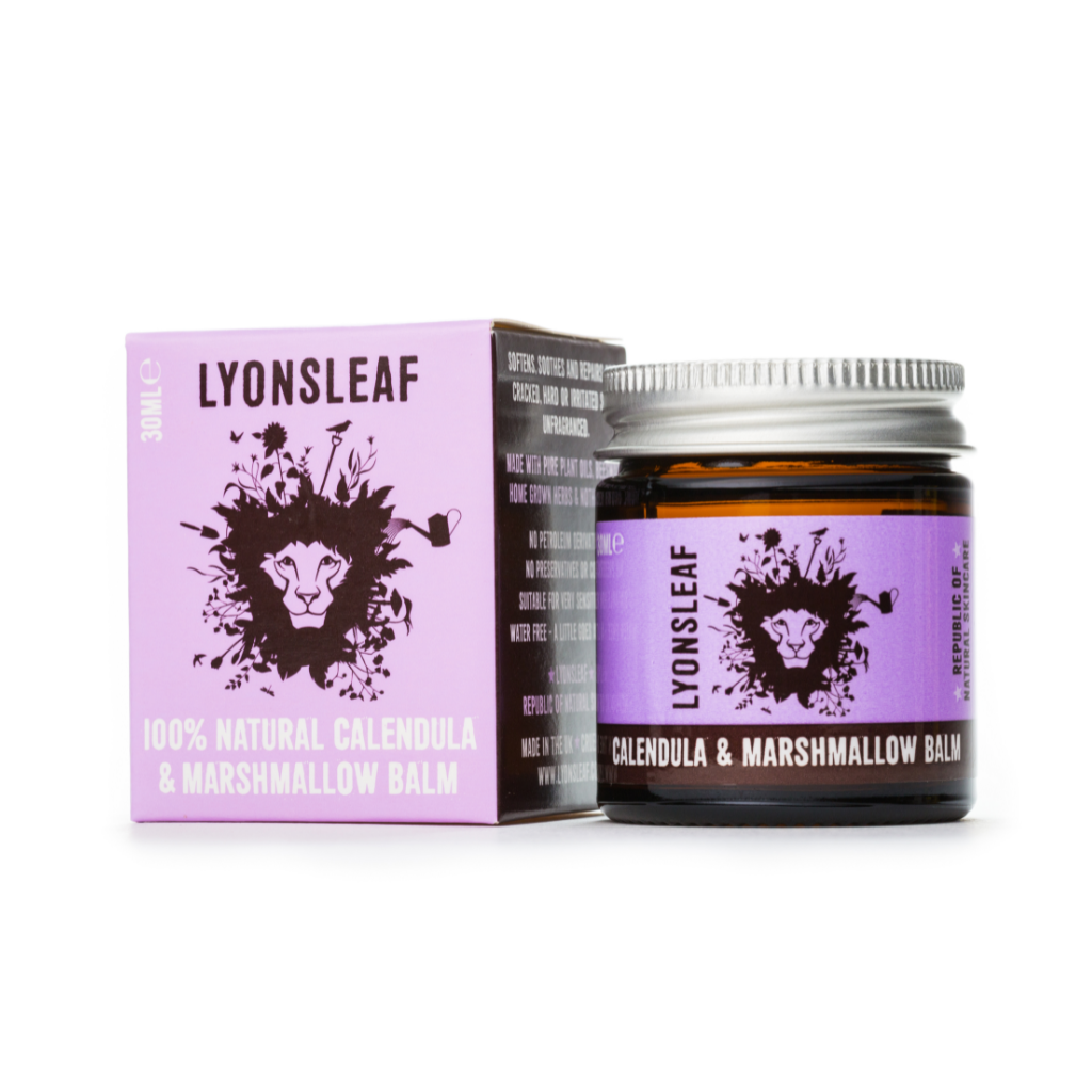 image of lyonsleaf marshmallow and calendula balm on a white background. 30ml jar size. On the left is a purple box and the right is a brown glass jar with aluminium lid. the glass jar has a purple label