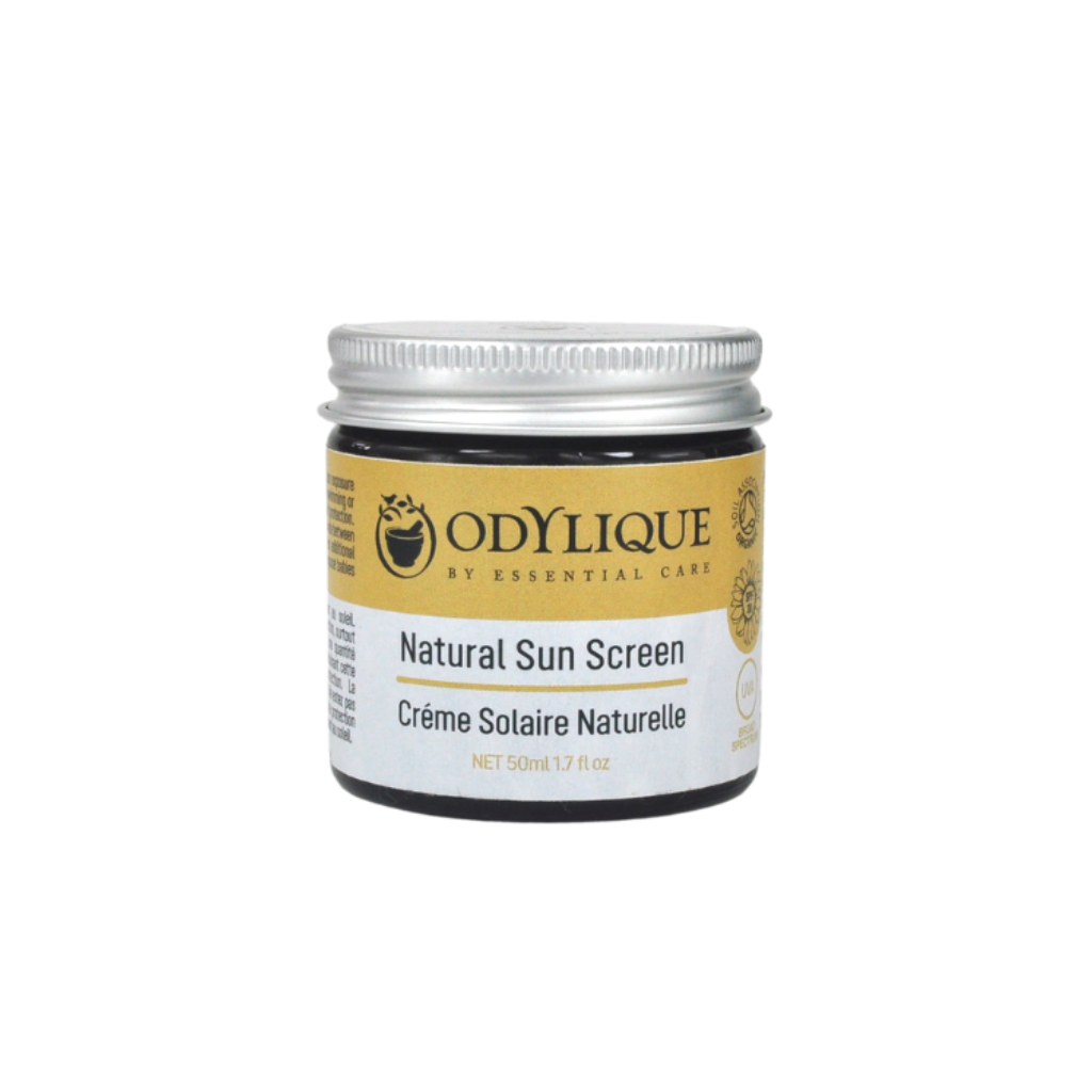 Odylique Natural Mineral Sun Screen SPF 30. Organic Sun Screen. The 50ml jar is pictured in and amber glass jar with an aluminium lid. The jar has a yellow and white label and the text is in English and French and reads ‘Natural Sun Screen - Créme Solaria Naturelle’