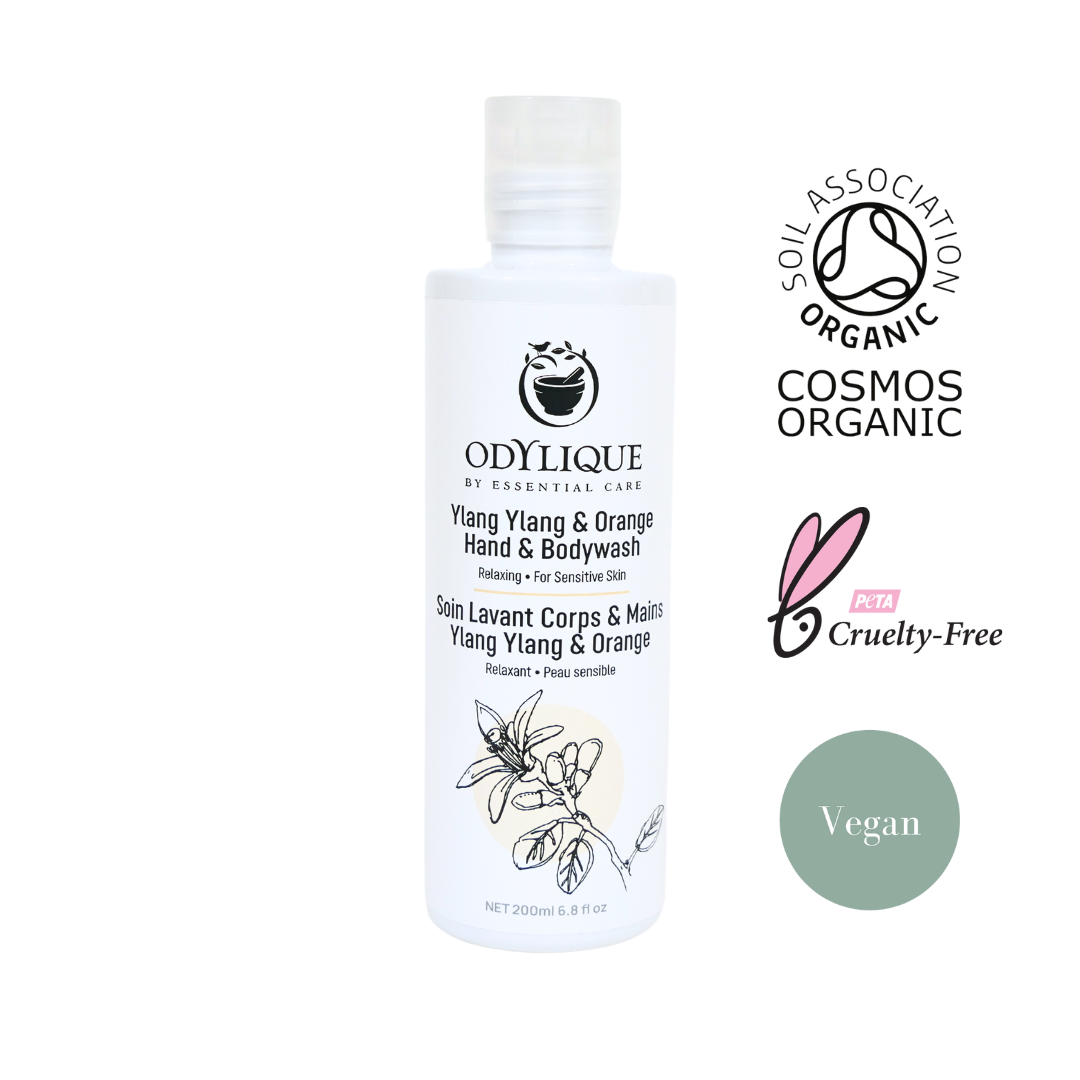 odylique ylang ylang and orange shower gel white bottle with certification logos to the right hand side showing it's organic, cruelty free and vegan