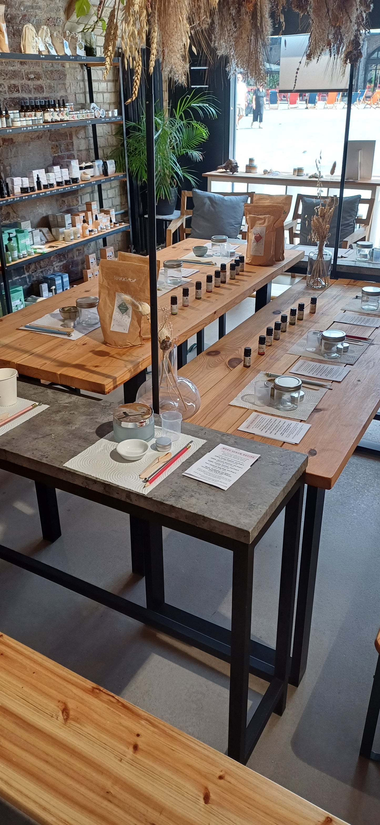 table set up for a group of 10 work colleagues to make their own bath salts together using natural ingredients.