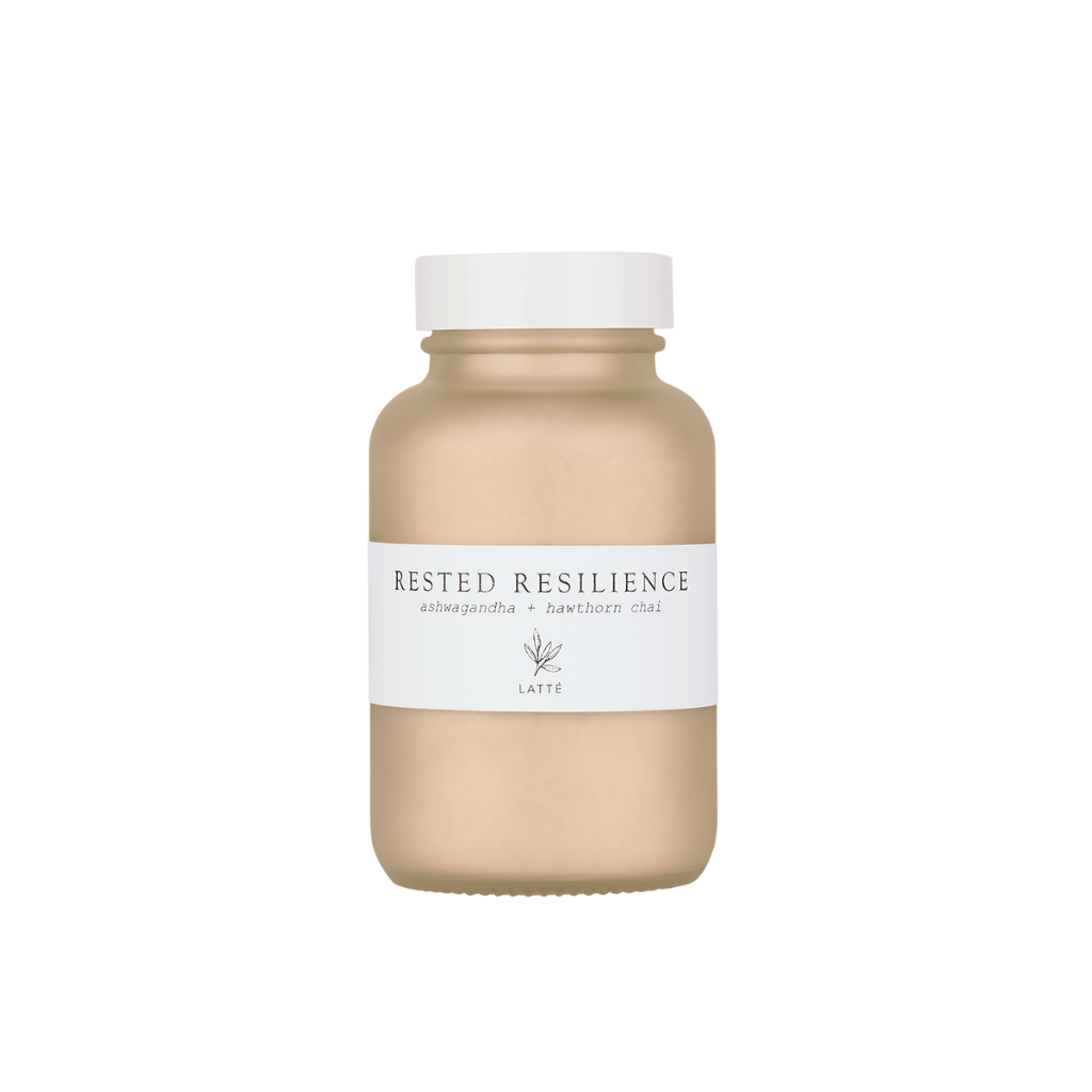 Forage Botanicals Rested Resilience Chai Latte Powder. Natural stress relief. The latte powder is pictured in a smokey glass jar with a simple white label.
