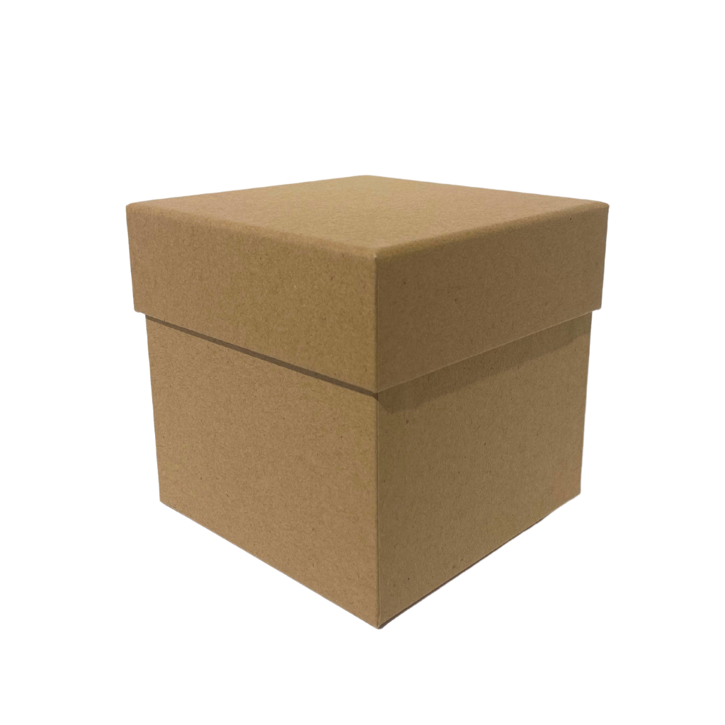 brown kraft cardboard gift box with lid in a small cube shape filled with brown kraft paper shred