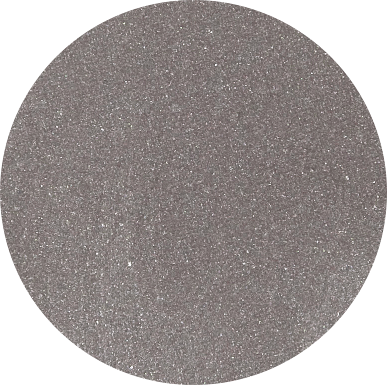 Close-up swatch of single pan Odylique organic eyeshadow in shade Slate, a deep semi-matte grey with purple undertones.