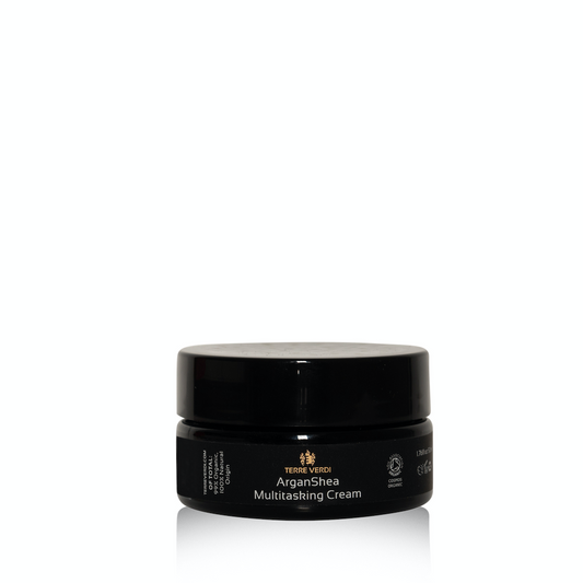 Terre Verdi ArganShea Multitasking Cream. Organic Hand Cream. In a black glass jar with a black label and white text.