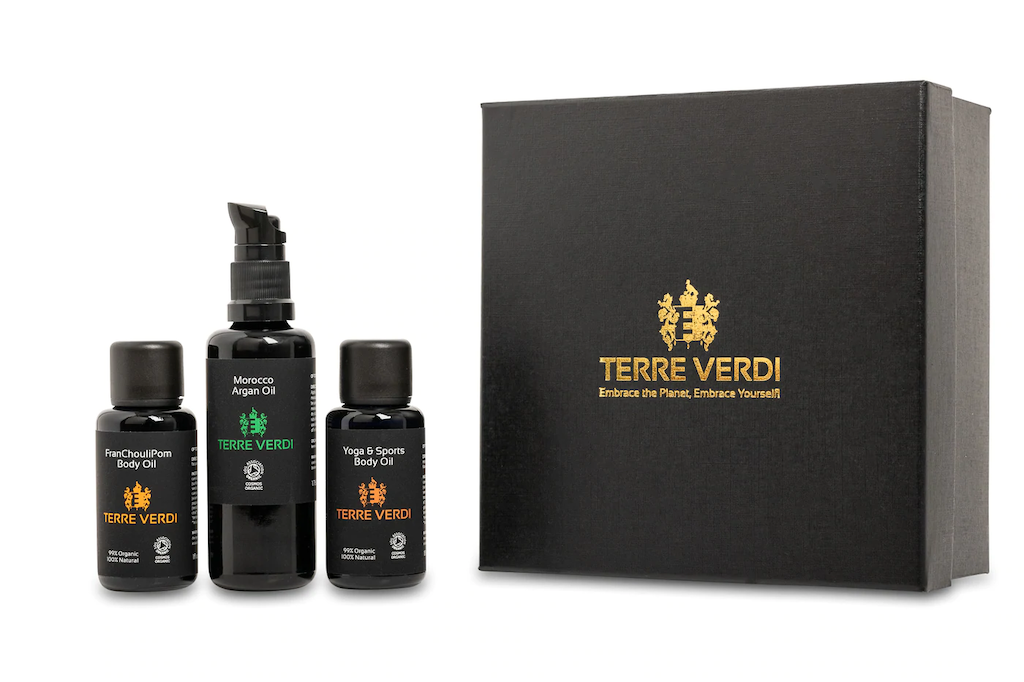 Terre Verdi Organic Gift Set for Body. Natural bodycare gift set. All three products are in black bottles and stand next to a luxury black box embossed in gold with the Terre Verdi logo.