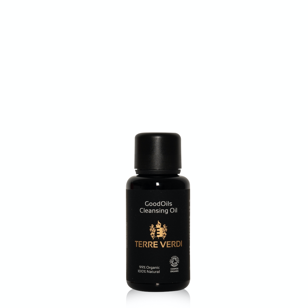 Terre Verdi GoodOils Cleansing Oil Travel Size. Certified Organic Face Cleanser. In a black glass bottle with a black plastic pump. With a black label with the logo in gold in the centre and all other text in white.