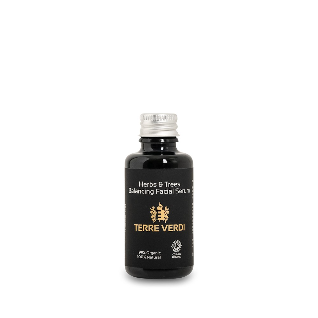 Terre Verdi Herbs & Trees Balancing Facial Serum Refill. Certified cruelty free face oil. In a black glass bottle with an aluminium screwtop lid. The label is black with the logo in gold in the centre and all other text in white.