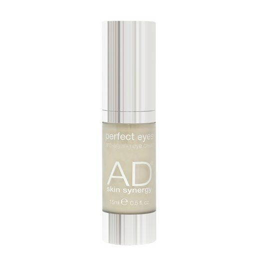 AD Skin Synergy Perfect Eyes eye cream. Award-winning natural skincare. Pictured is the clear 15 ml bottle with silver pump and silver text the product comes in. 
