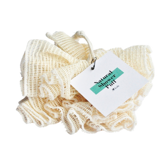 Photograph of the Acala Natural shower puff in a cream colour made from the ancient fibre Ramie. Complete with a hanging/wrist loop. 