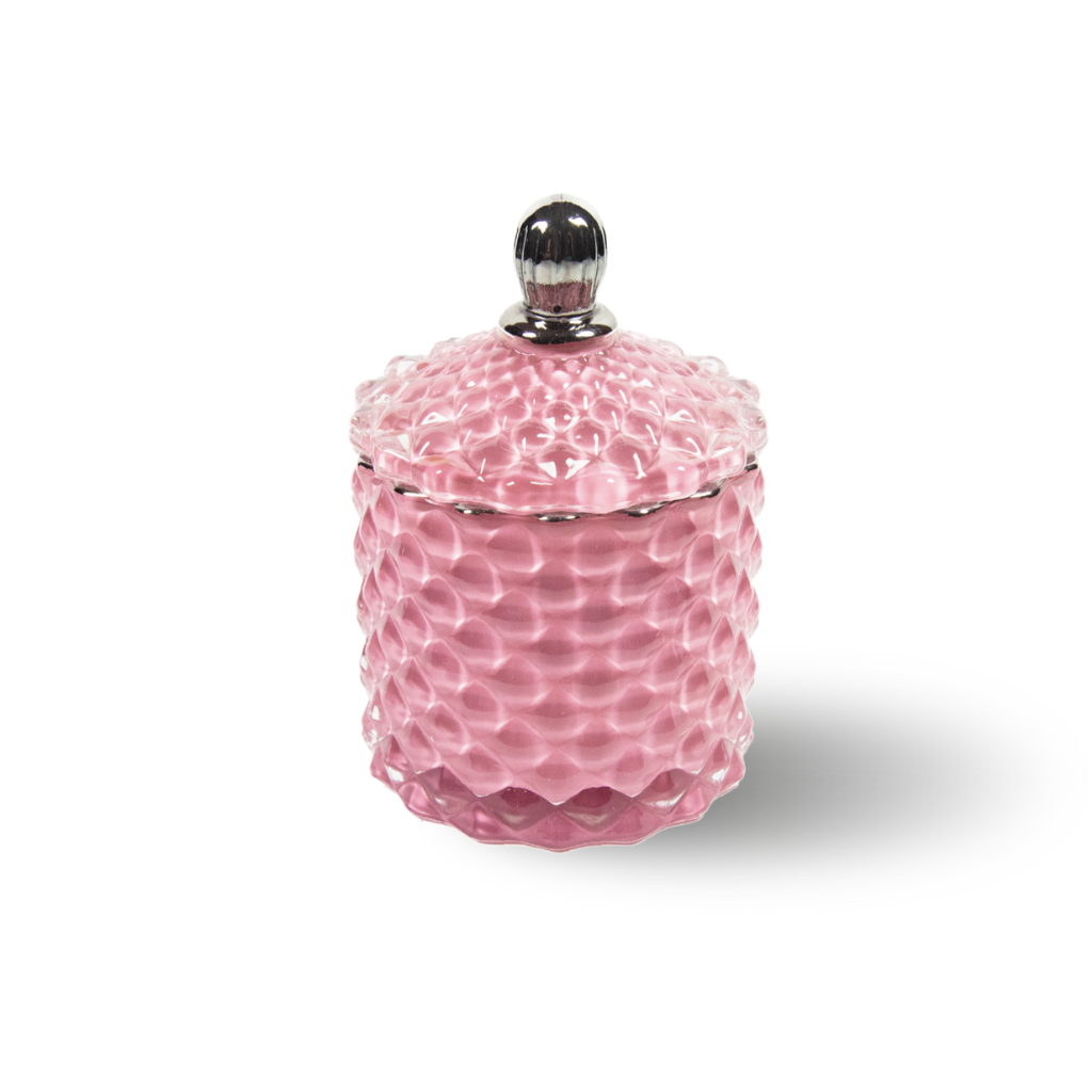 Bowe organics candle, picture on a white background is a soy candle in a pink textured glass, with a pink textured glass lid and a silver handle. 