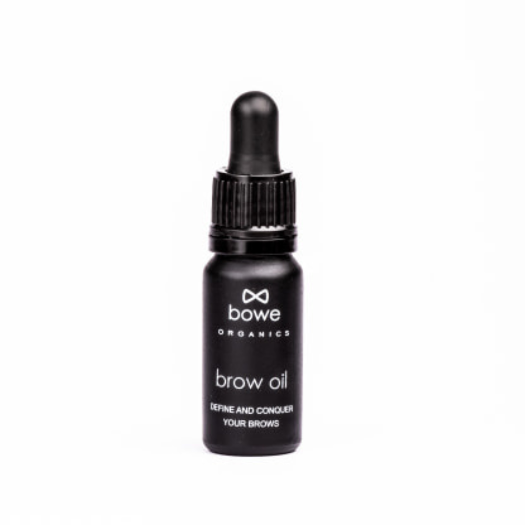 Bowe Organics Brow Oil photographed on a white background. the vegan brow treatment oil is in a matt black glass bottle with a black rubber and plastic pipette. the label reads 'bowe organics brow oil’ ‘define and conquer your brows’