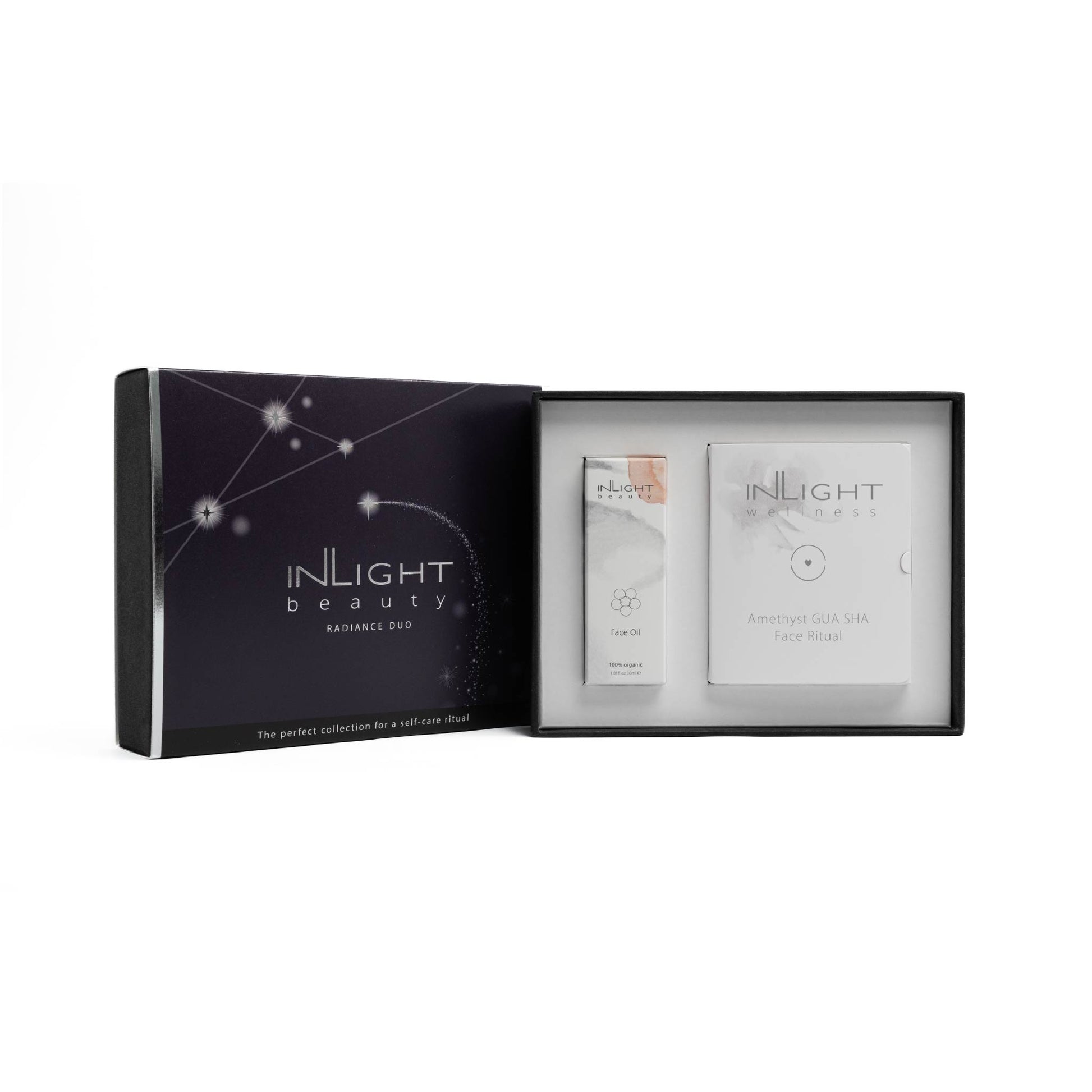 inlight beauty face oil and amethyst gua sha gift set in the base box with festive sleeve to the left
