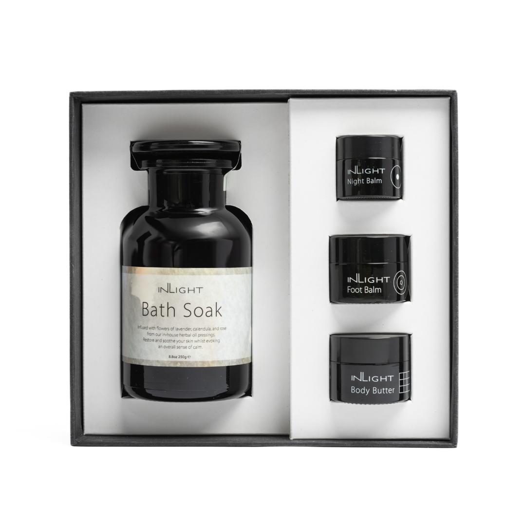 top down view of the bath salt gift set from inlight beauty which is handmade in cornwall and also includes 3 organic natural skincare products a night balm, foot balm, body butter making it a good gift for someone wanting some relaxation and help their sleep