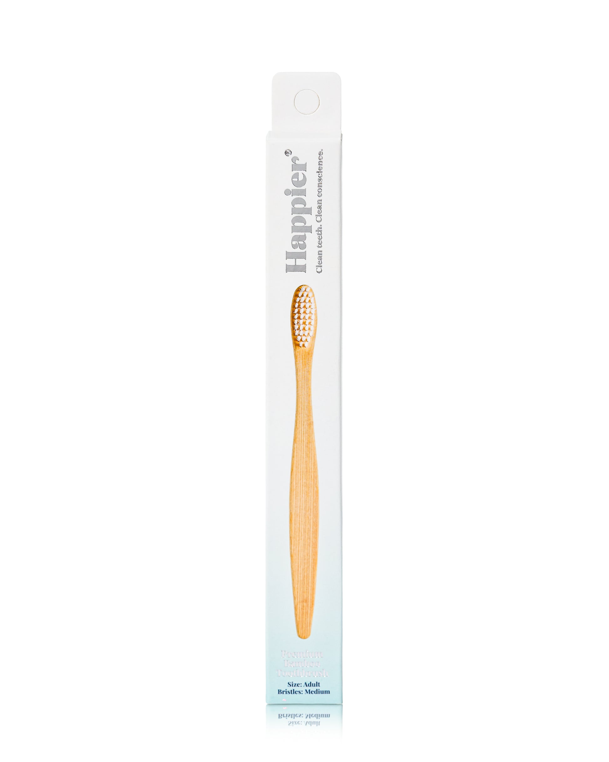 bamboo wooden toothbrush in a box from natural dental brand happier beauty