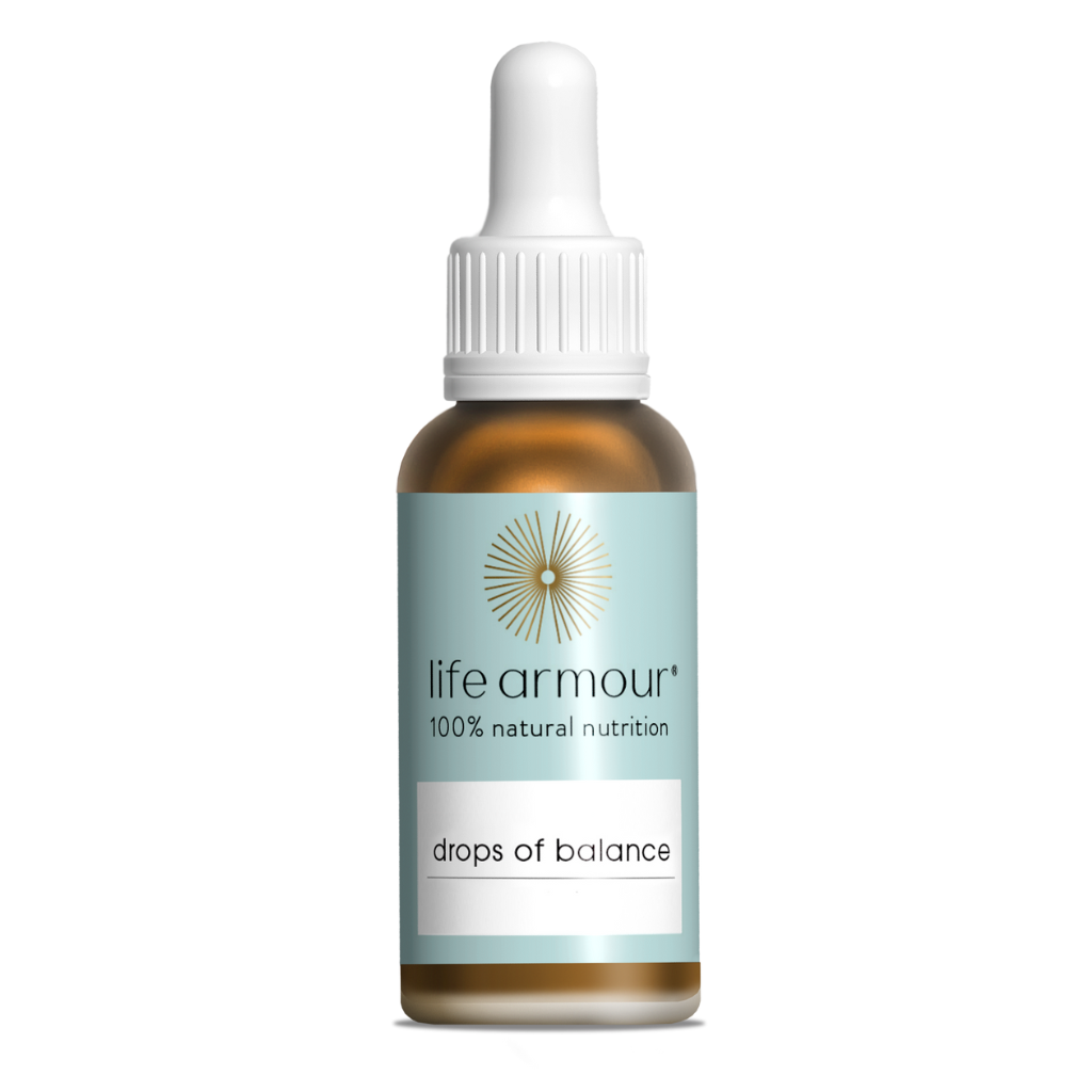 An amber glass bottle labeled "life armour® 100% natural nutrition drops of balance." It features a white dropper cap and a light blue label with a sunburst logo above the text.