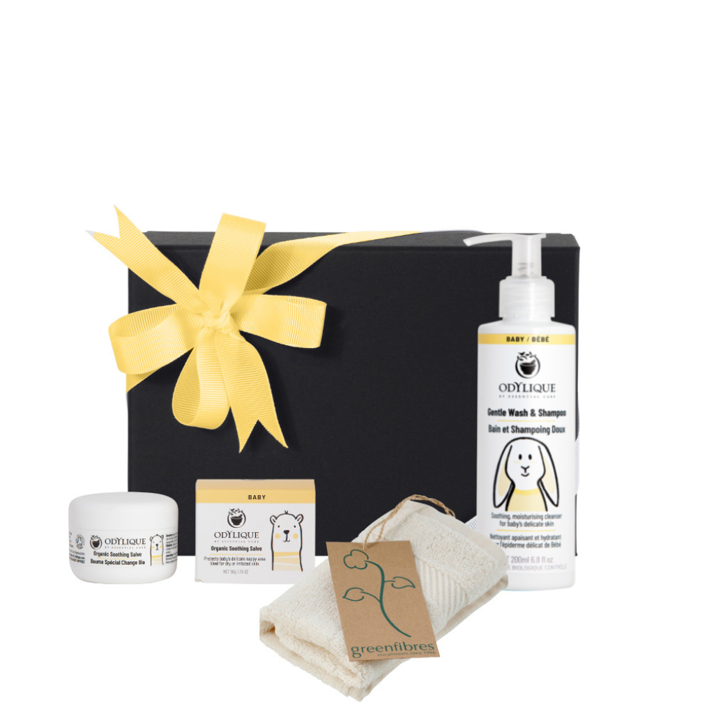organic baby skincare gift box in a black rectangulr gift box and yellow ribbon. 2 full size gentle baby skincare products and a natural fibre cloth