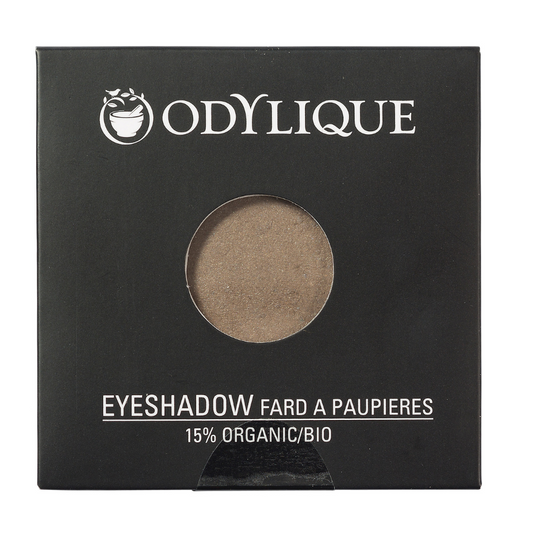 Single pan Odylique eyeshadow in shade Bark, placed in its black packaging.