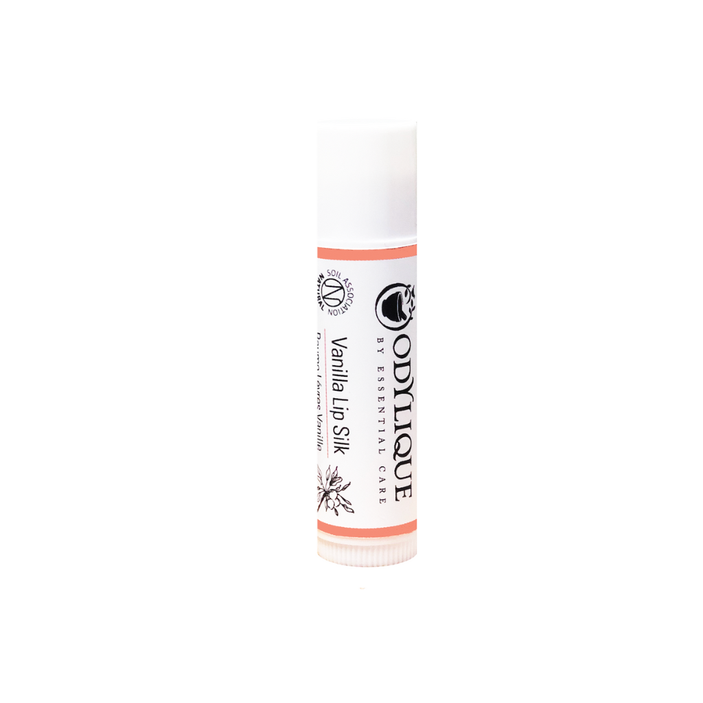 A white tube of the Odylique Organic Vanilla Lip silk, set against a plain white background.