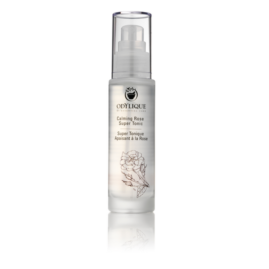 odylique calming rose super tonic in a clear glass bottle with a clear plastic pump and lid on a white background