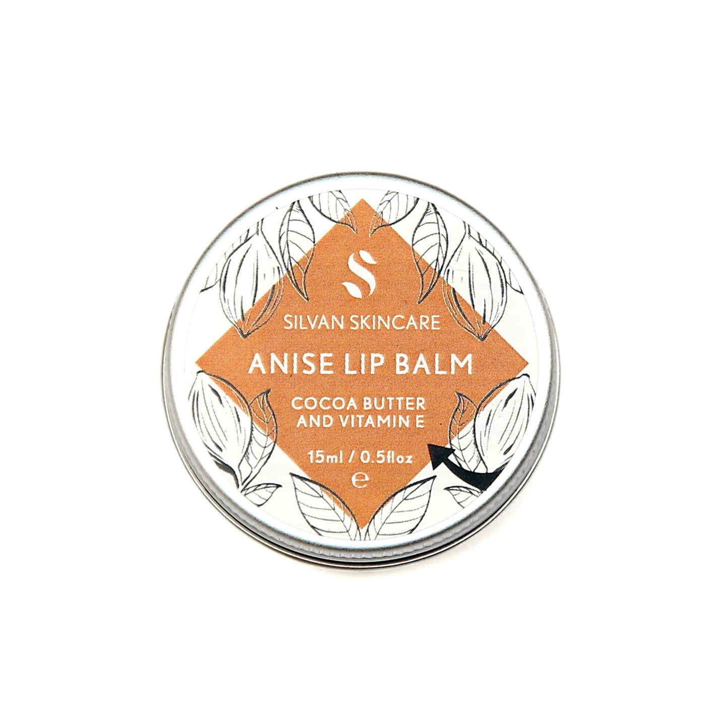 Single aluminium tin of the Silvan Skincare anise lip balm. The label is round and white with a central diamond in dark orange and botanical illustrations around it.