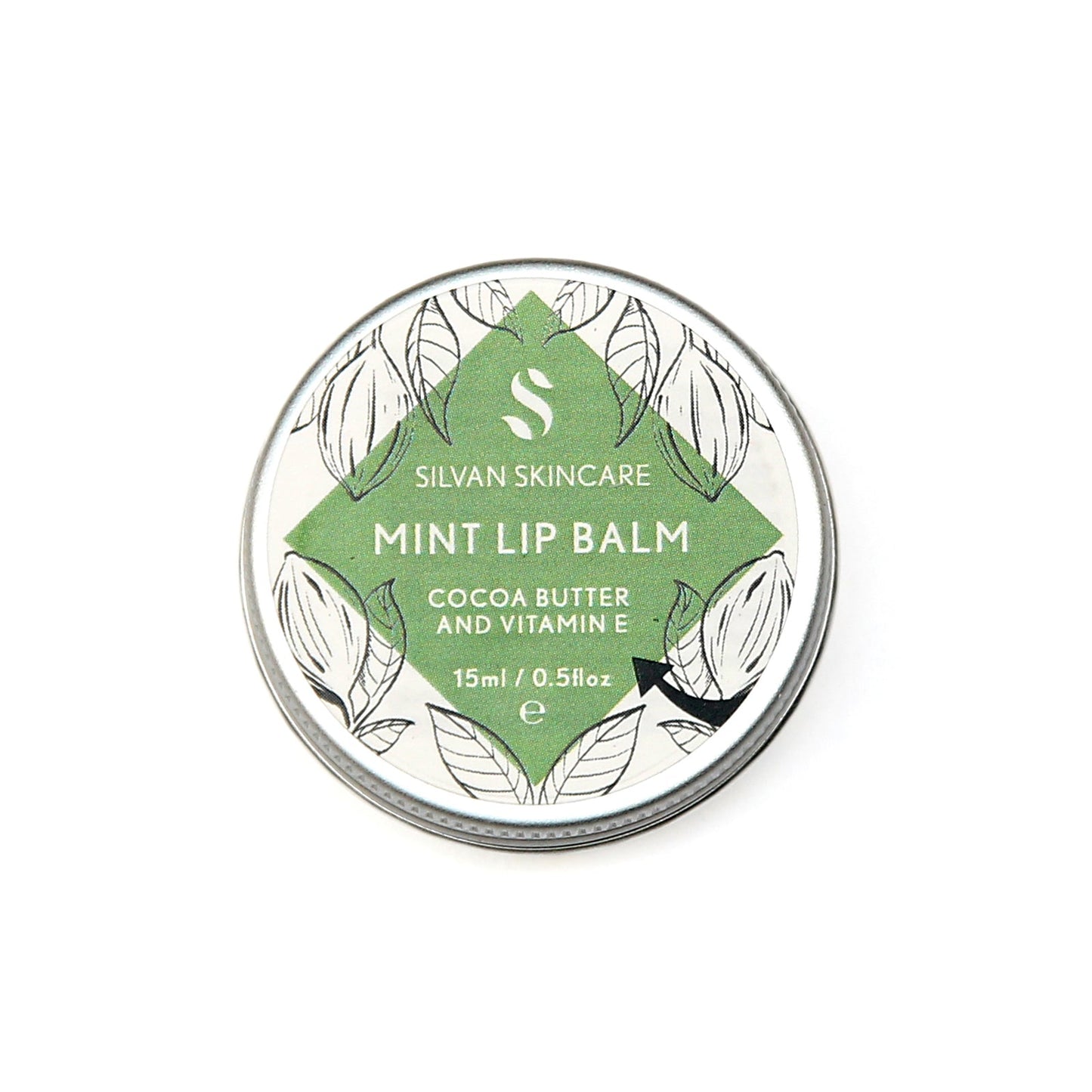 Single aluminium tin of the Silvan Skincare mint lip balm. The label is round and white with a central diamond in green and botanical illustrations around it.