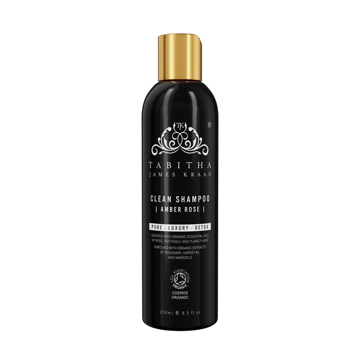 amber and rose organic shampoo in a black bottle with gold lid