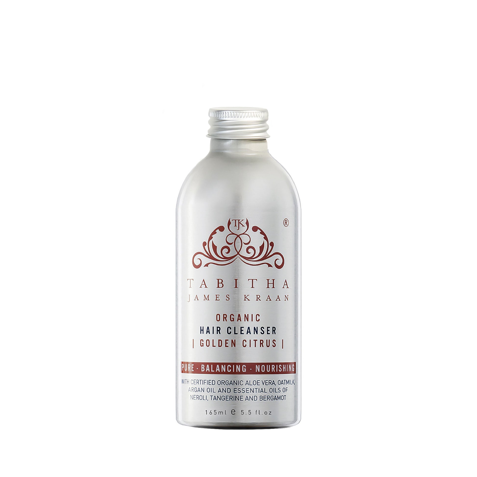 golden citrus organic shampoo hair cleanser in an aluminium bottle