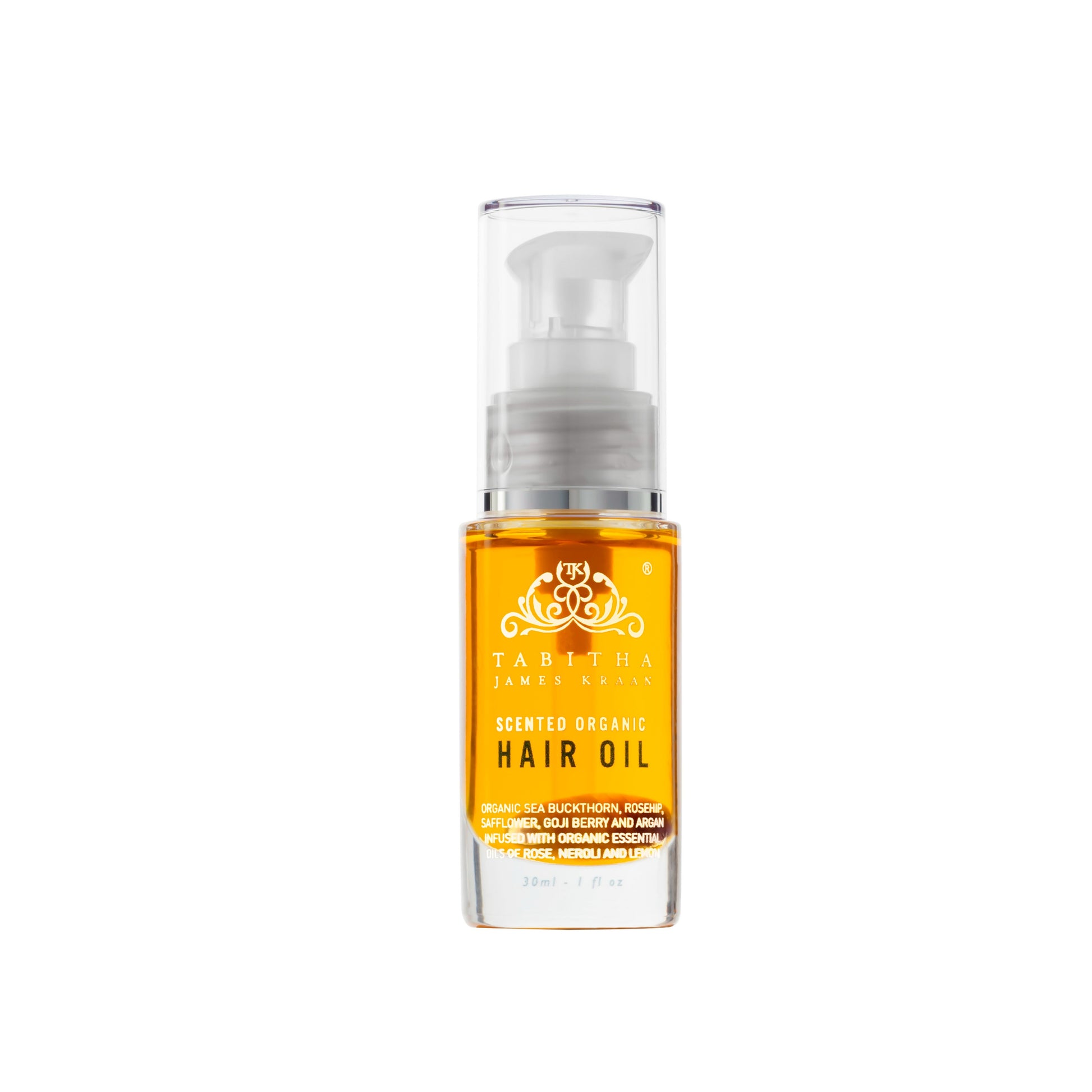 organic hair oil in a clear glass bottle with a pump. the oil is an orange colour as it contains sea buckthorn