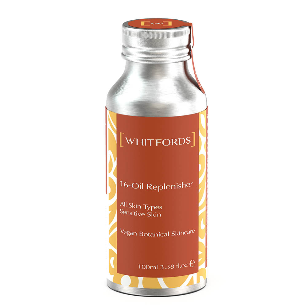 Whitfords skincare body oil in an aluminium bottle with dark orange label on a white background. the label reads ' whitfords 16-oil replenisher. all skin types, sensitive skin, vegan botanical skincare'