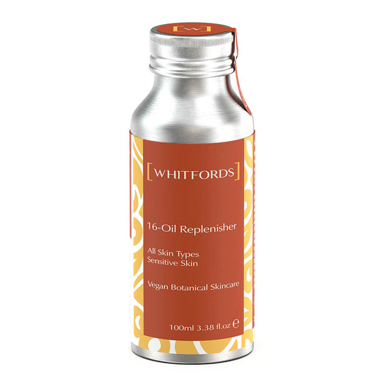 Whitfords skincare body oil in an aluminium bottle with dark orange label on a white background. the label reads ' whitfords 16-oil replenisher. all skin types, sensitive skin, vegan botanical skincare'