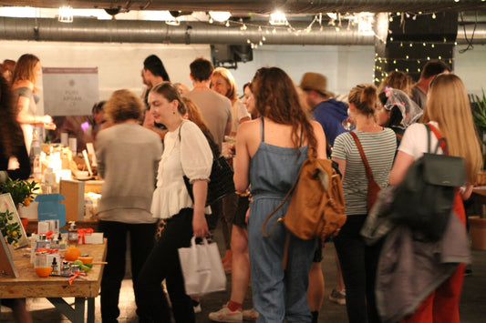 crowd of people at blomma beauty's natural beauty shopping market