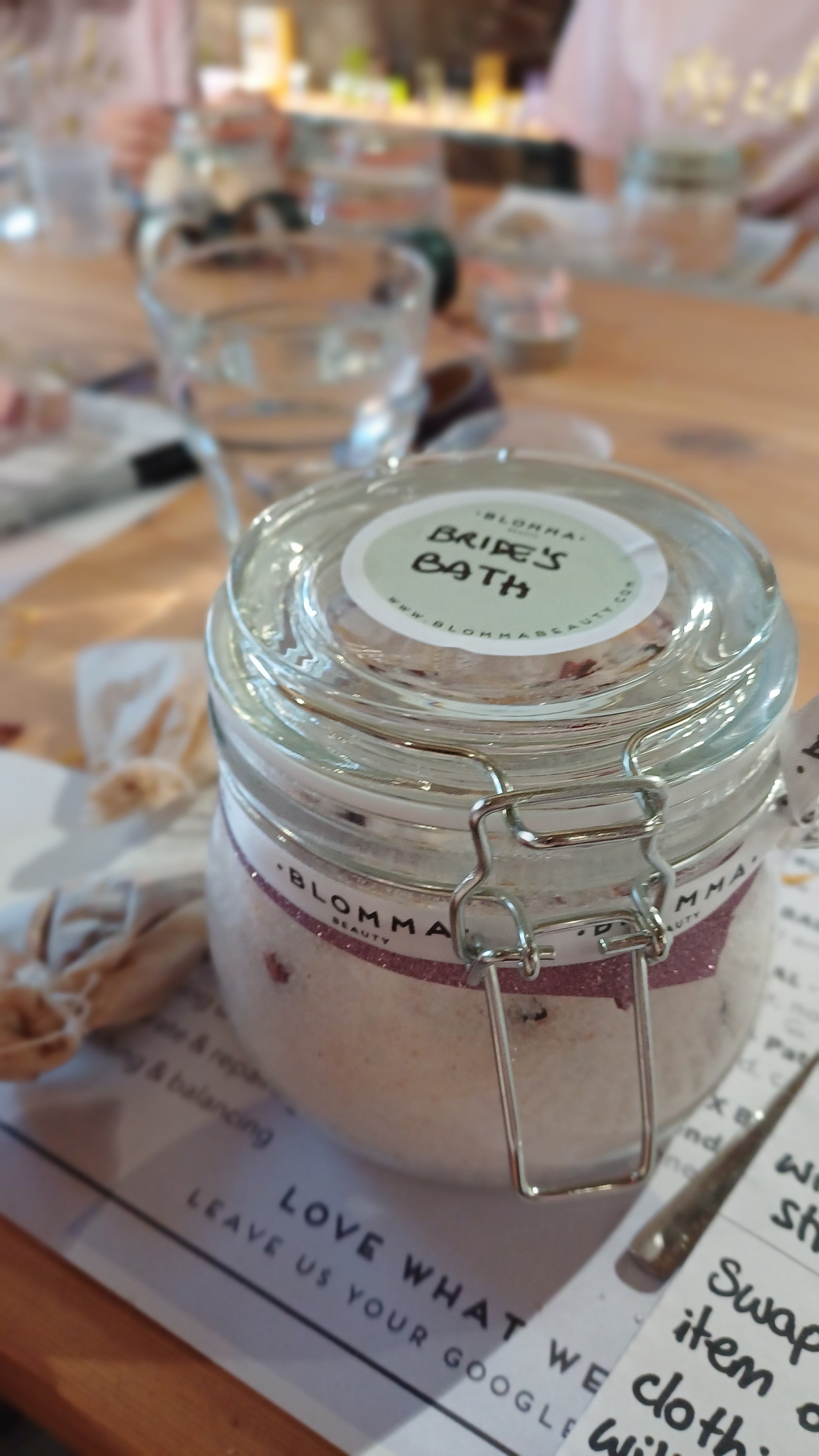 jar of bath salts that have been made for the bride to be at a private hen party experience in london