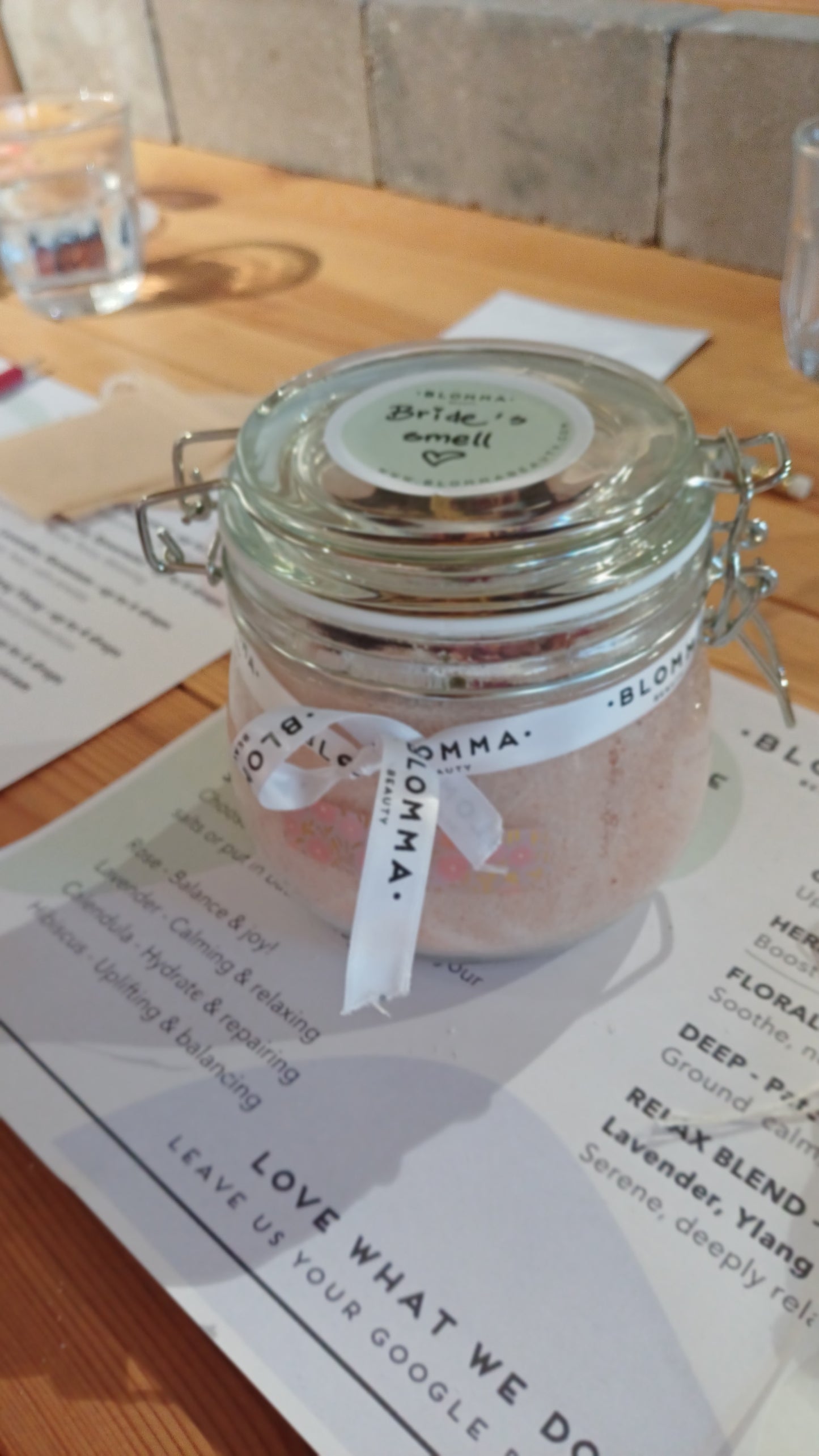 jar of handmade bath salts on a table 