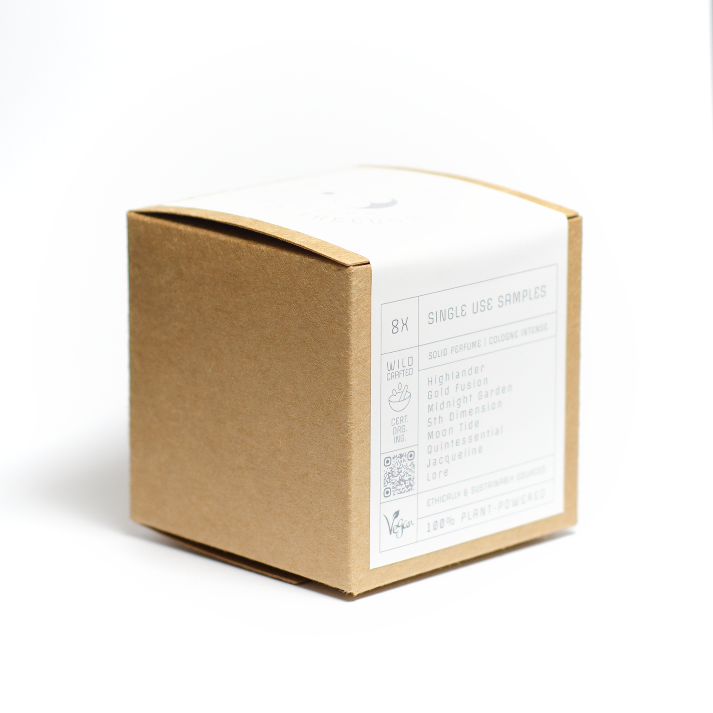 brown kraft box with white label showing the outer packaging of the freedom scents solid perfume discovery box 