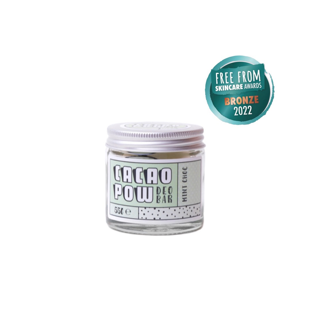 clear jar of cacao pow natural deodorant cream stick with aluminium lid. Mint choc scent with badge to show it won bronze in the free from skincare awards in 2022