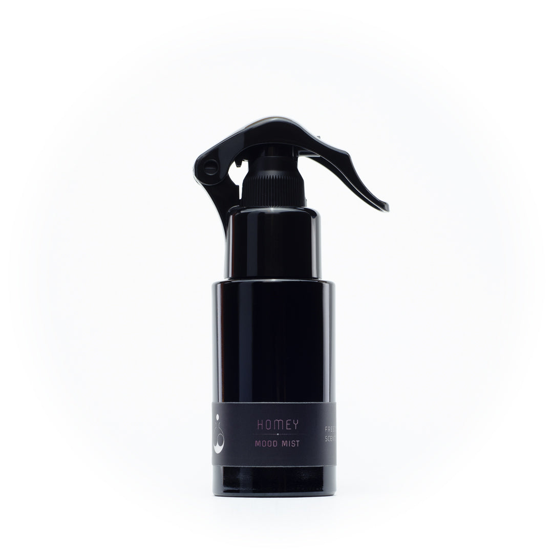 small sized room and linen spray in a black bottle with spritz pump on a white background