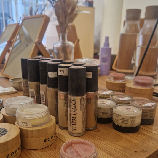 selection of natural mineral make up on  wooden table in the blomma beauty make up studio