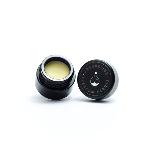 solid perfume balm 100% natural, organic made in uk on white background