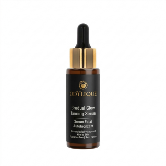 Odylique Gradual Glow Tanning Serum bottle with dropper on a white background
