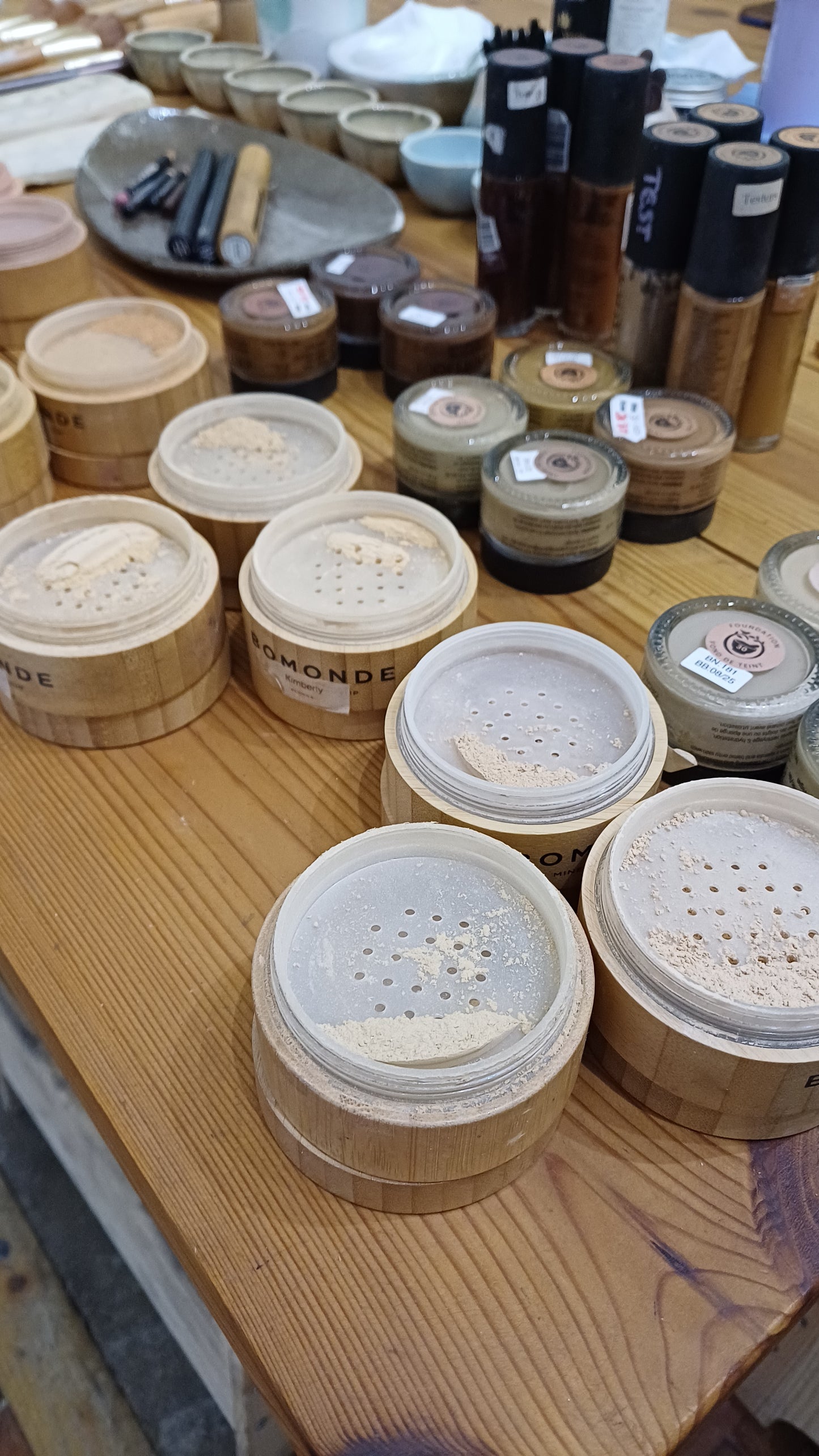 makeup products on a table as part of a makeup class in london