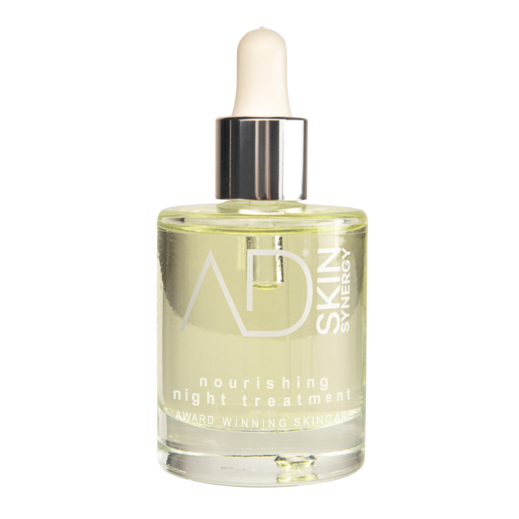 AD Skin Synergy Nourishing Night Treatment. Natural Face Oil. Award-winning skincare. Anti-aging skincare. Pictured in a large glass bottle with a pipette.