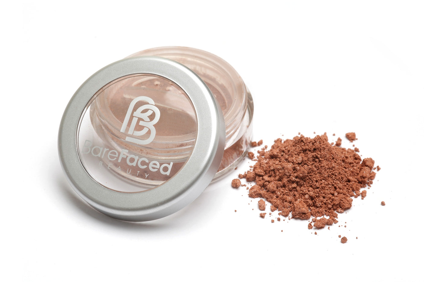 A small round pot of mineral bronzer, with a swatch of the powder next to it showing a warm/medium shade of bronzer -  for all skin types