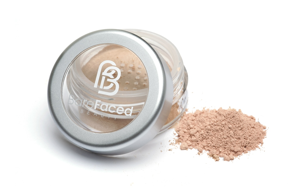 BareFaced Beauty Natural Mineral Foundation Make up Sample in Beautiful. Ethical mineral makeup. The powder mineral foundation is pictured in a clear plastic jar with a small pile of the powder sitting next to it.
