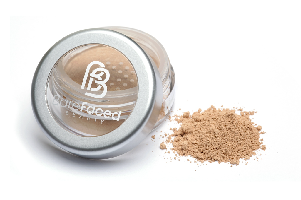 BareFaced Beauty Natural Mineral Foundation in Gentle. Ethical mineral makeup. The powder mineral foundation is pictured in a clear plastic jar with a small pile of the powder sitting next to it.