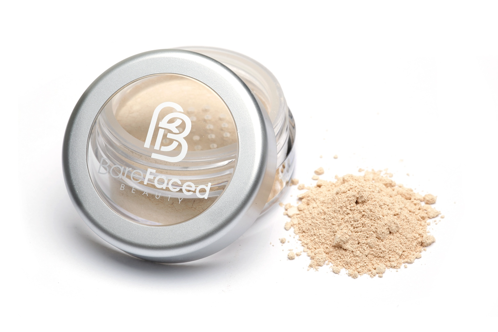 BareFaced Beauty Natural Mineral Foundation in Serenity. Ethical mineral makeup. The powder mineral foundation is pictured in a clear plastic jar with a small pile of the powder sitting next to it.