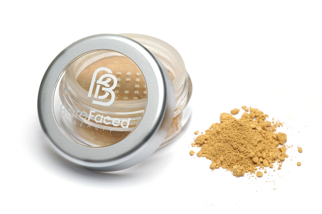BareFaced Beauty Natural Mineral Foundation in Tender. Ethical mineral makeup. The powder mineral foundation is pictured in a clear plastic jar with a small pile of the powder sitting next to it.