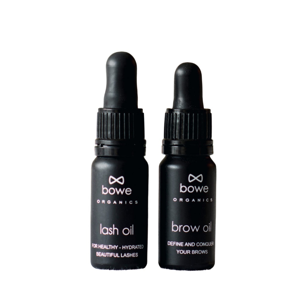Bowe Organics Gift of Brows and Lashes. Vegan gift sets. The lash oil and brow oil are pictured next to each other in their black glass bottles.