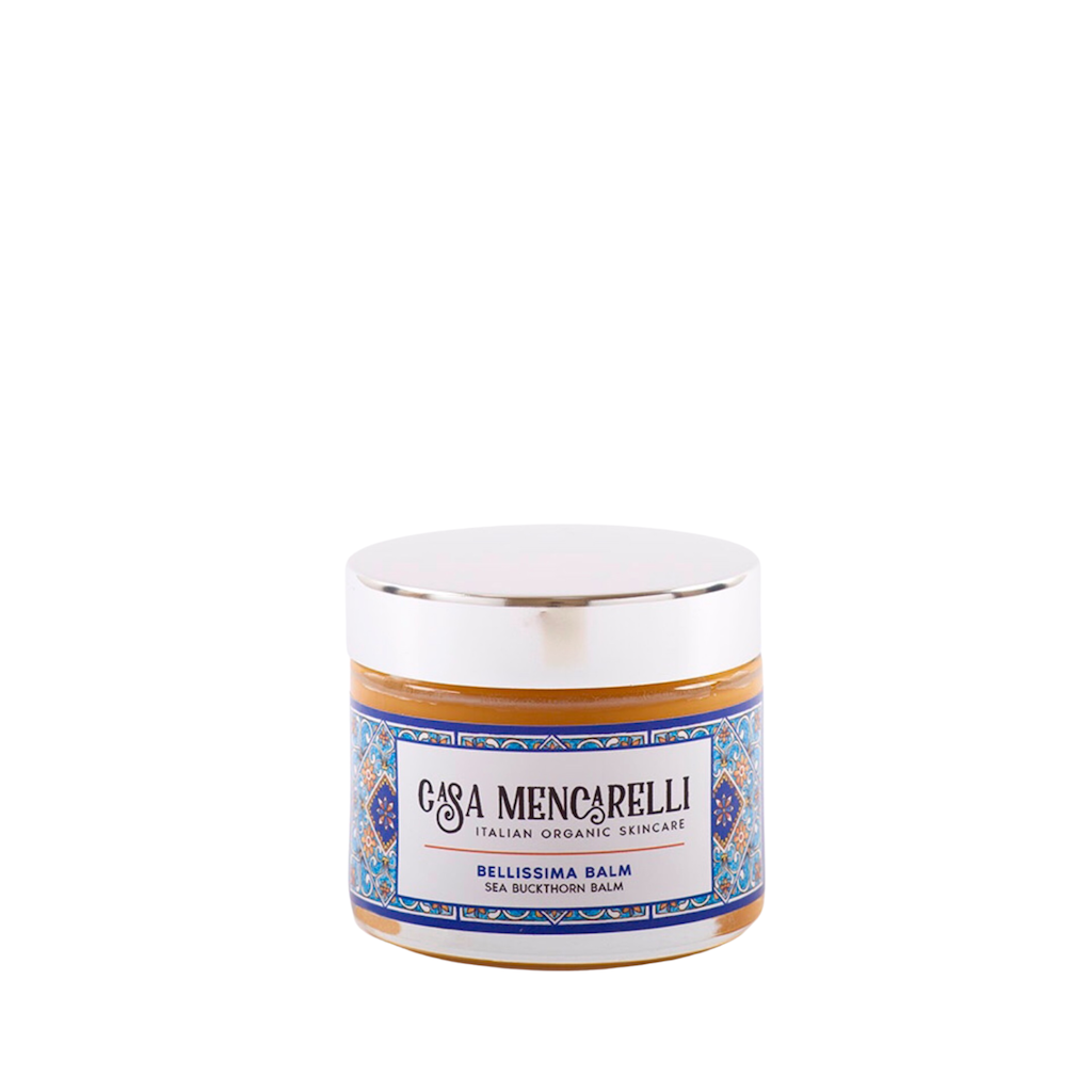 Casa Mencarelli Bellissima Sea Buckthorn Balm. Multipurpose vegan skincare. The balm is pictured in a glass jar and labelled with illustrations of the traditional tiling of Umbria in Italy.